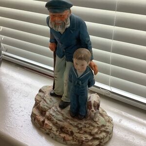Norman Rockwell’s “Looking Out To Sea”